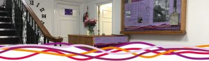 Reception desk and Canon Godber interpretation panel at the John Godber Centre, Hucknall