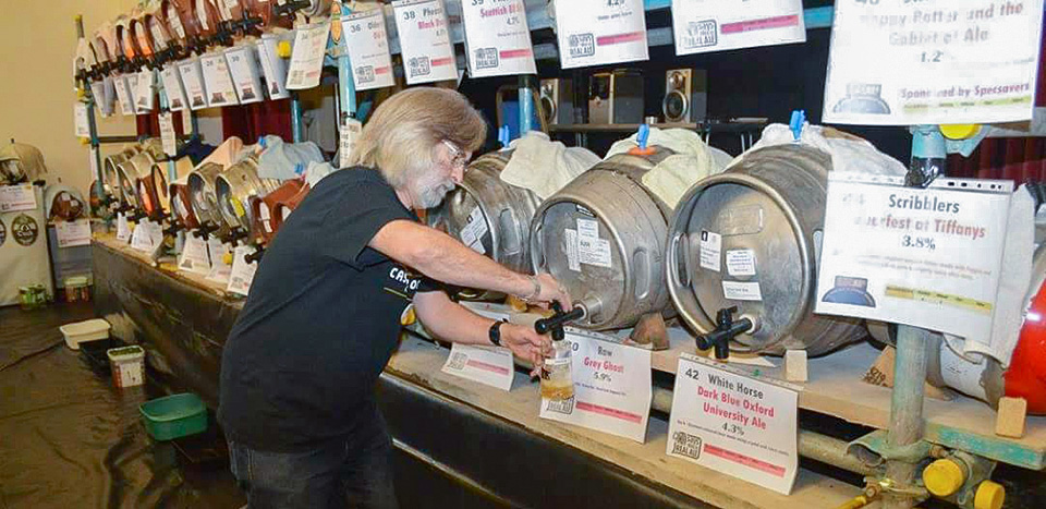 Setting up the kegs for the Hucknall Beer Festival at the John Godber Centre, Hucknall