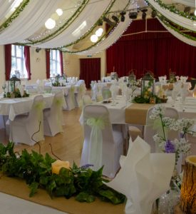 Main Hall room prepared for a woodland-themed wedding reception