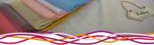 Selection of coloured wedding reception chair sashes